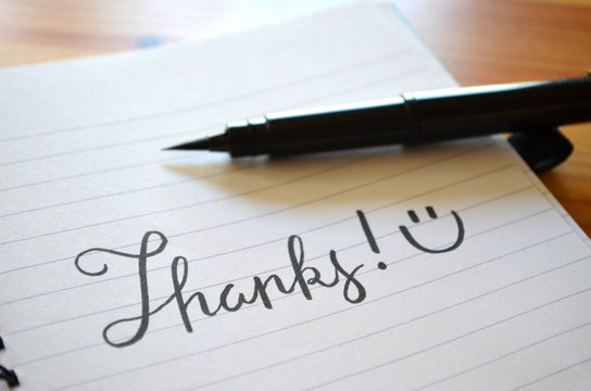 THANKS hand lettered on notepad