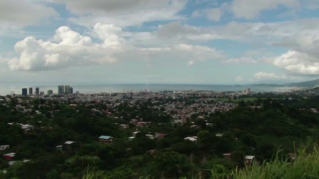 Slow elevated pan across Port of Spain, Trinidad. Taken from Lady Young Road overlook point