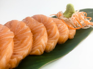 Slice salmon sashimi isolated on white background