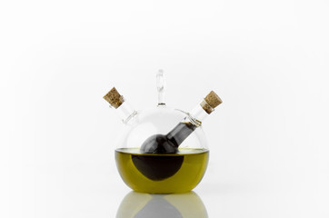 Olive Oil And Vinegar Bottle On White Background With Reflection
