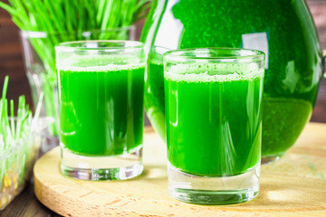 Wheatgrass shot. Juice from wheat grass. Trend of health