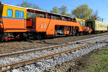 Obraz premium View on the maintenance train on railroad track
