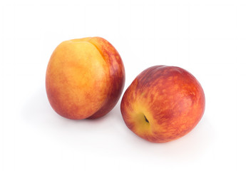 Nectarines on a white background