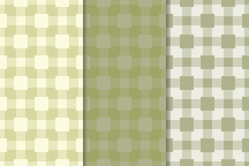Checkered plaid fabric background. Olive green seamless pattern