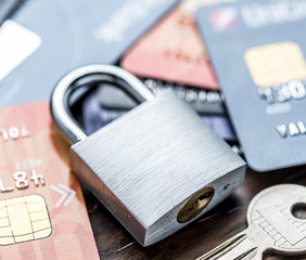 Credit cards and simle mechanical lock.