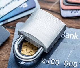 Credit cards and simle mechanical lock.
