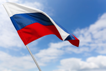 Russian flag against blue sky