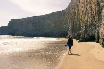 Alone at a beach with cliff line