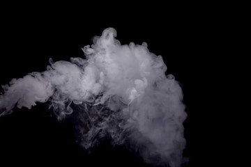 Abstract white smoke against dark background