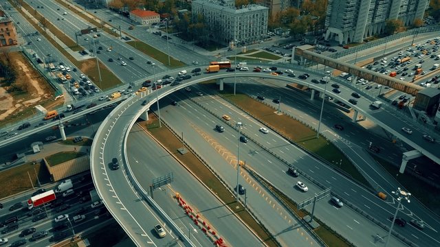 Traffic jam on city highway interchange, Moscow. Aerial shot