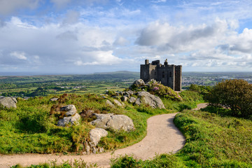 Fototapeta na wymiar The castle on the top of Carn Brea, a hill overlooking the town of Redruth in Cornwall