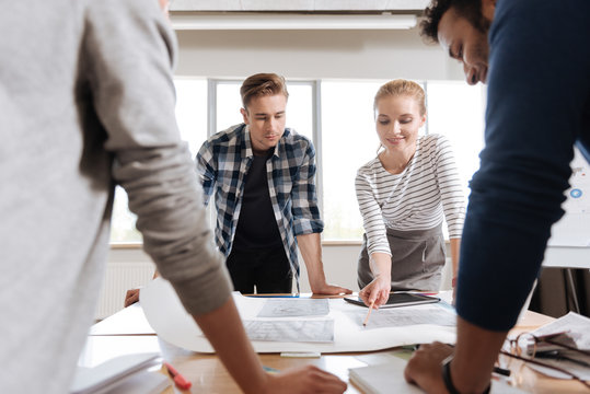 Nice professional engineers focusing on their project