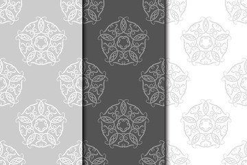 Floral vintage ornaments. Gray seamless patterns for fabric and wallpaper