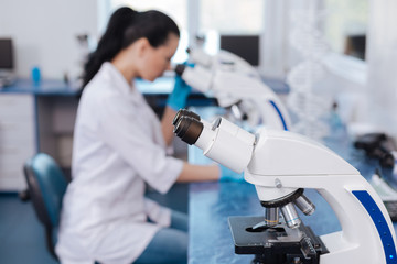 Attentive practitioner doing gene analysis