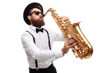 Naklejka premium Bearded man playing a saxophone