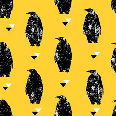 Seamless pattern with penguin and triangles. Ornament for textile and wrapping. Vector background.