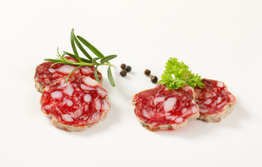 slices of dry cured salami with spices