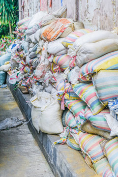 Sandbags pile for flood defense