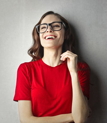 Happy woman with black glasses smiling