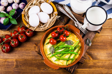 Obraz na płótnie Canvas Omelette with vegetables