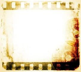 Grunge sepia film strip frame.