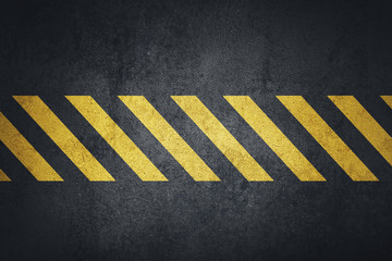 Fototapeta premium Old black grungy metal plate surface with yellow warning stripes