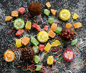 Appetizing sweets on sugarly background