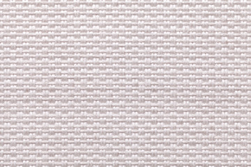 White background of dense woven bagging fabric, closeup. Structure of the textile macro.