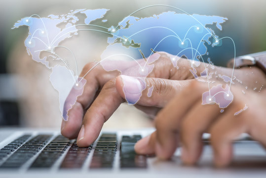 Social media, Close up hands on laptop with world map and internet link path background.