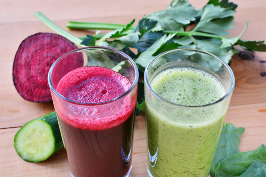 Healthy vegetable juice beet and green smoothie in glasses