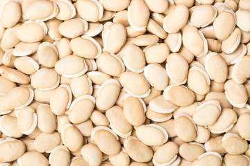 dried raw hyacinth beans on white, top view
