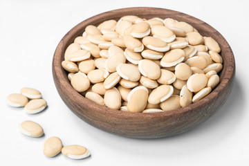 dried raw hyacinth beans on white, (large depth of field, taken with tilt shift lens)