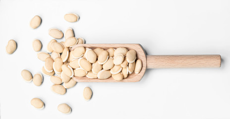 dried raw hyacinth beans on white, top view