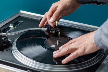 DJ manipulate with Record and Turntable Tonearm, Scratching 
