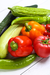 various colorful vegetables on white wooden table
