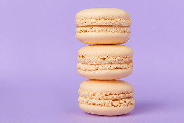 Three sweet orange macaroons