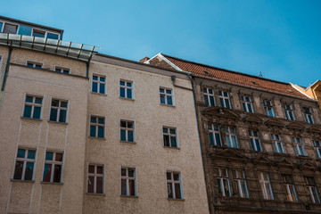 Fototapeta na wymiar white and brown dirty destructive houses at berlin