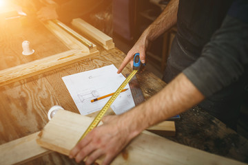 professional carpenter working in the workshop