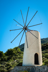 Greece, Crete, Windmills on the green hill