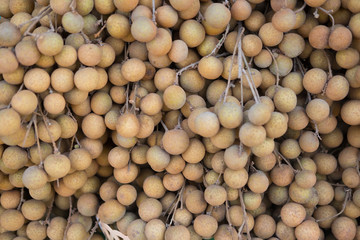 Stack pile of fresh fruit longan.