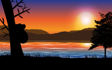 Sunset landscape with sea,mountain and tree with koala silhouette. Vector illustration. © tolgabarin