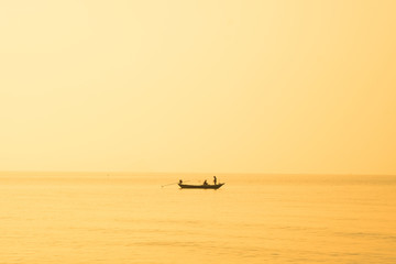 Abstract Fishing small boat in the sea with vintage color tone