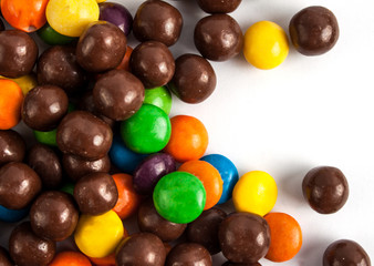 Multicolored candy on a white background.