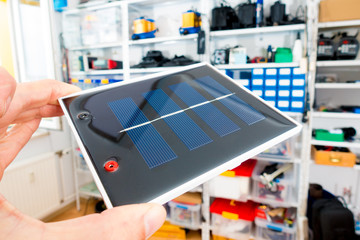 portable solar cell in hand