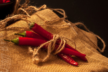 red Chili peppers on a black background