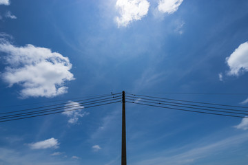Fototapeta premium Electric pole blue sky