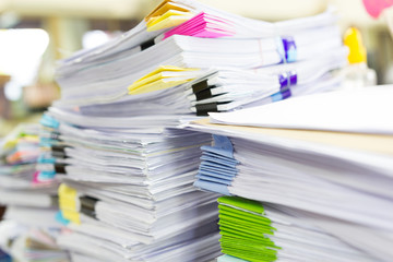Pile of unfinished documents on office desk, Stack of business paper
