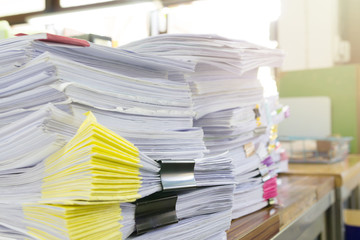 Pile of unfinished documents on office desk, Stack of business paper