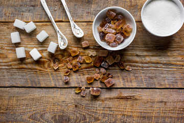 white and brown sugar for cooking sweets on kitchen wooden table top view mock-up