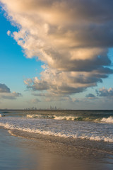 Sandy beach with Gold Coast skyline in the distance